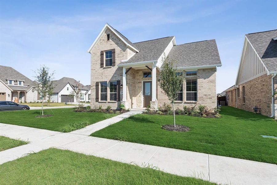 View of front of home with a front lawn