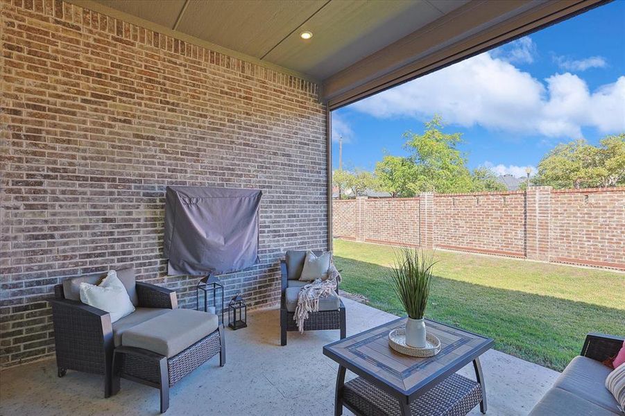 View of patio with outdoor lounge area