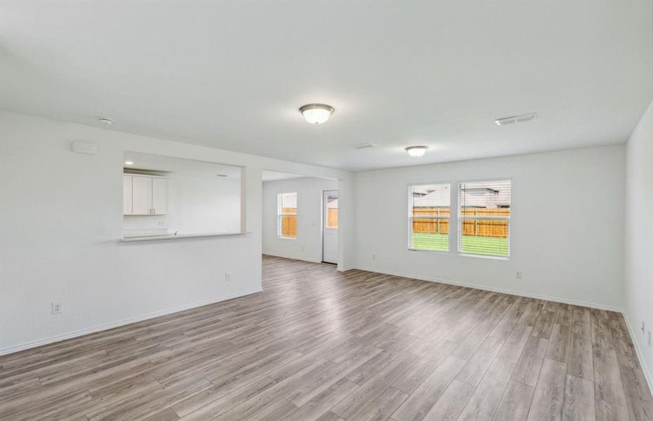 Airy gathering room with large windows*real home pictured