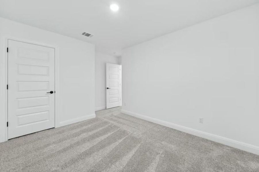 Photo of Pulte model home with same floor plan, not of actual home listed.