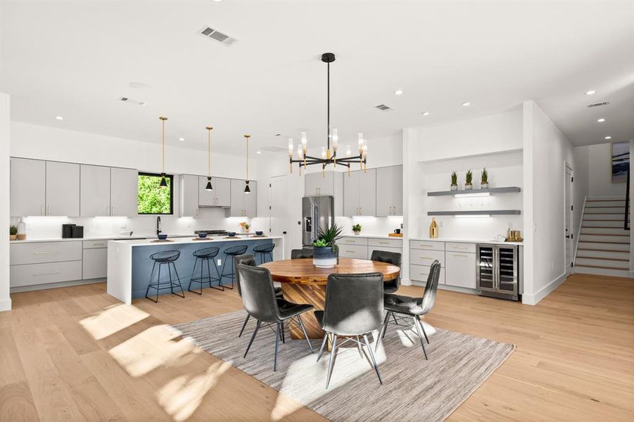 Exquisite open-concept gourmet kitchen and dining area, perfect for entertaining and culinary delights.