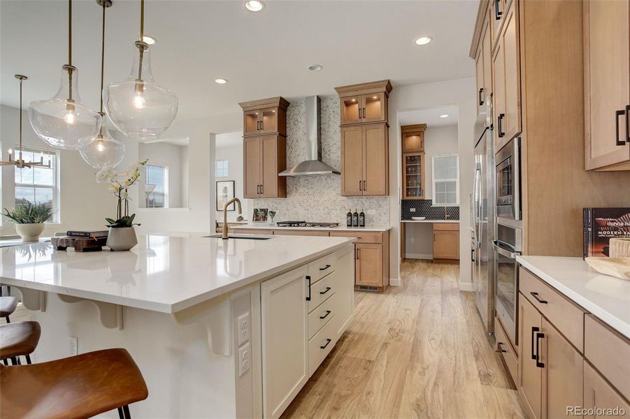 State of the Art Kitchen, Quartz countertops, cabinet lighting, spacious island