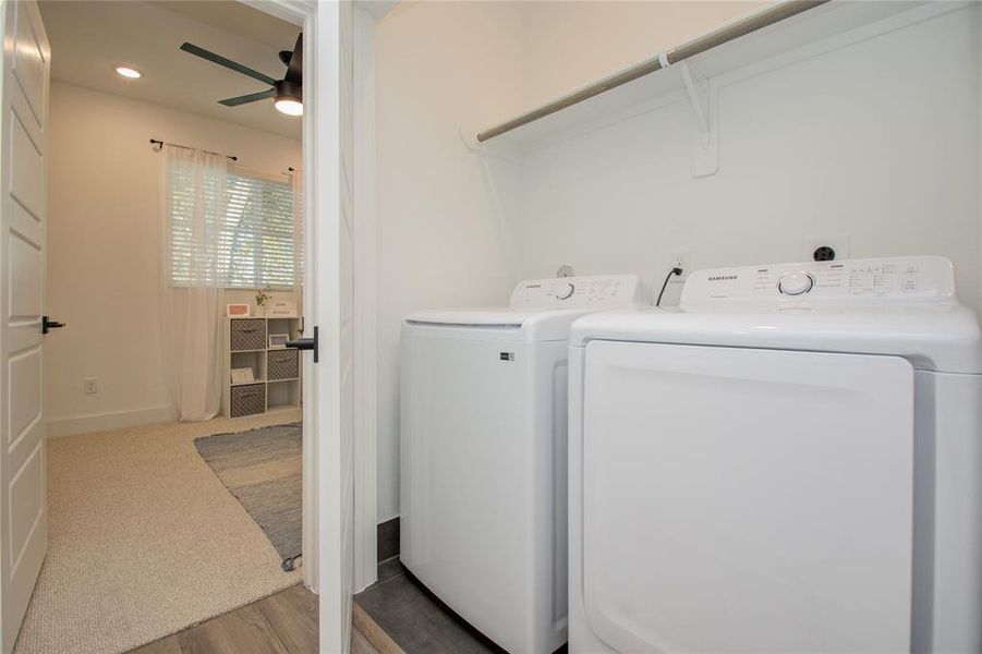 Laundry room on the third floor! Photos from another community by the same builder, FINISHES & FLOOR PLAN WILL VARY! Ceiling fans are not included!
