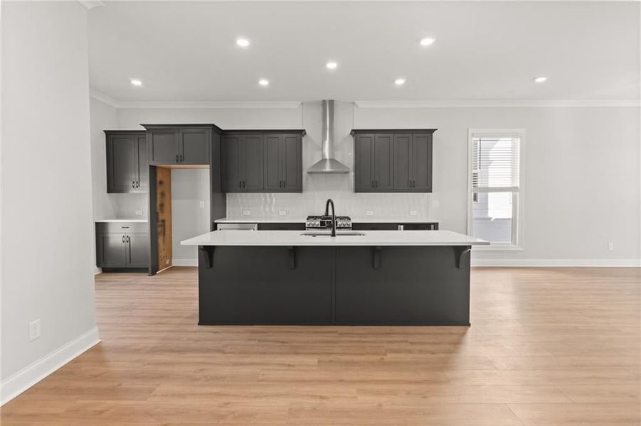 Add some barstools to invite guests to sit while prepping dinner. NOT actual home. Photos of previously built Grayton floorplan.