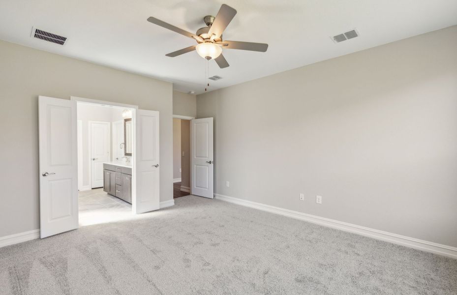 Elegant owner's suite with private bath