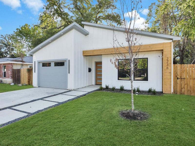 View of front of house featuring a front lawn