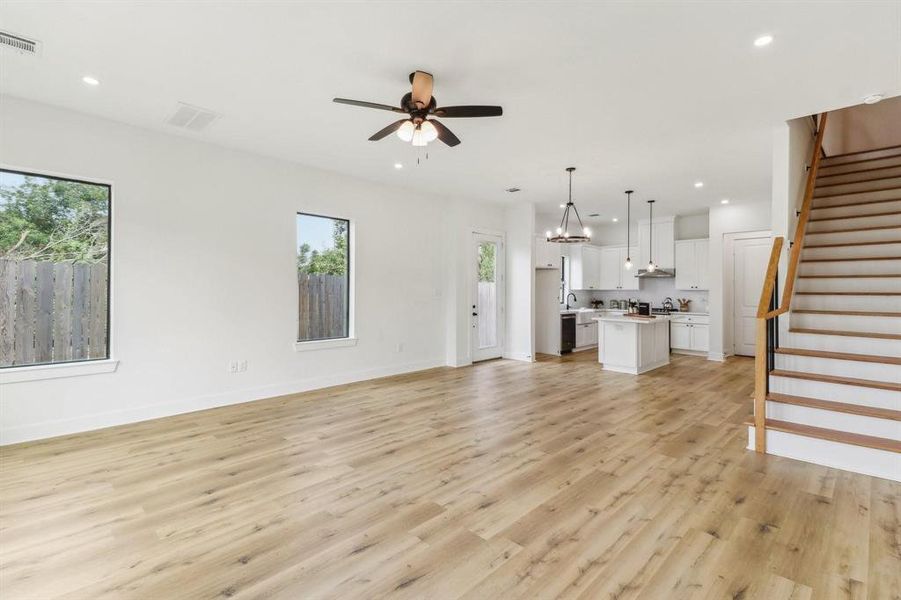 Living area leading to the kitchen area. Photo from a previous project.