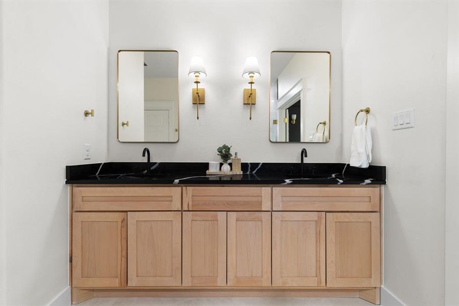 Bathroom featuring vanity