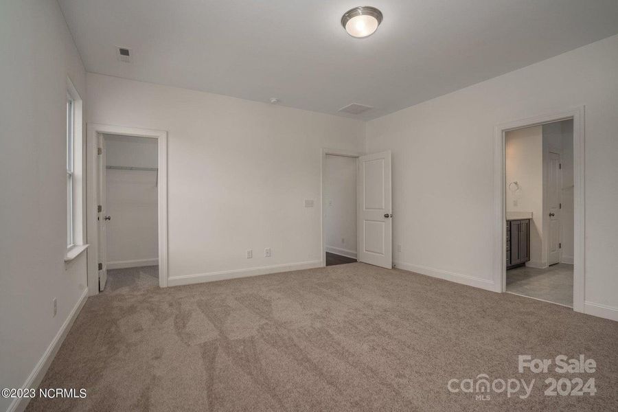 Concept Photo of Spacious Primary Bedroom with walk in closet & private bath!