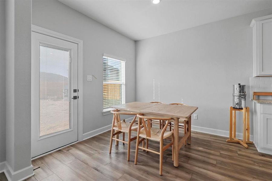 Dining area featuring light hardwood / wood-style flooring