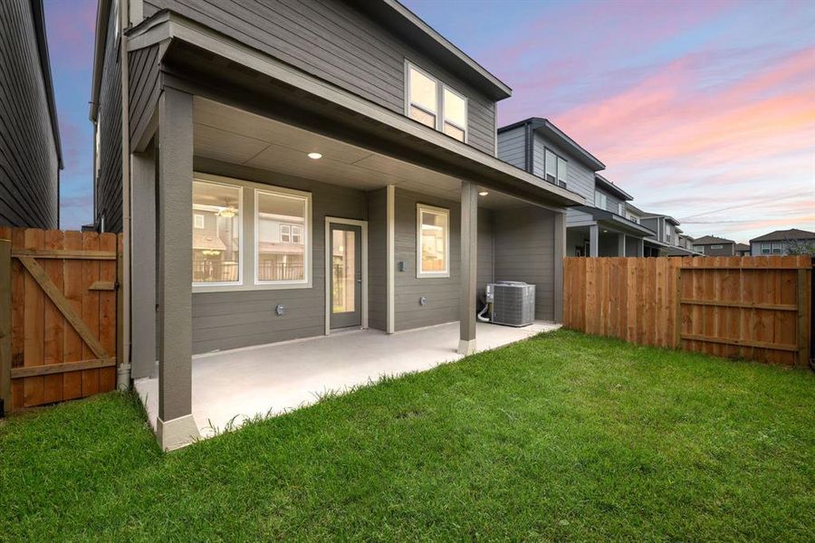 Come and see this spacious backyard with its beautiful covered patio. There is plenty of room for the kids to play and adults to relax!