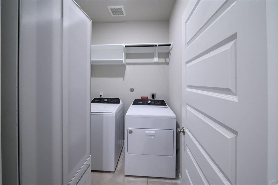 In-house utility room. Washer & Dryer included.