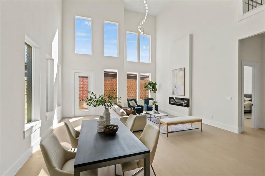 Dining area with a towering ceiling