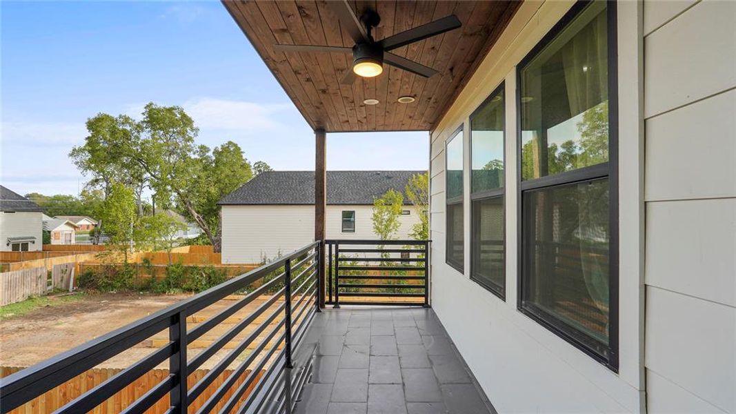 Balcony featuring ceiling fan