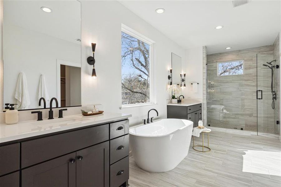 Primary Bath. Representative photo from a similar home completed by the builder, Homebound.