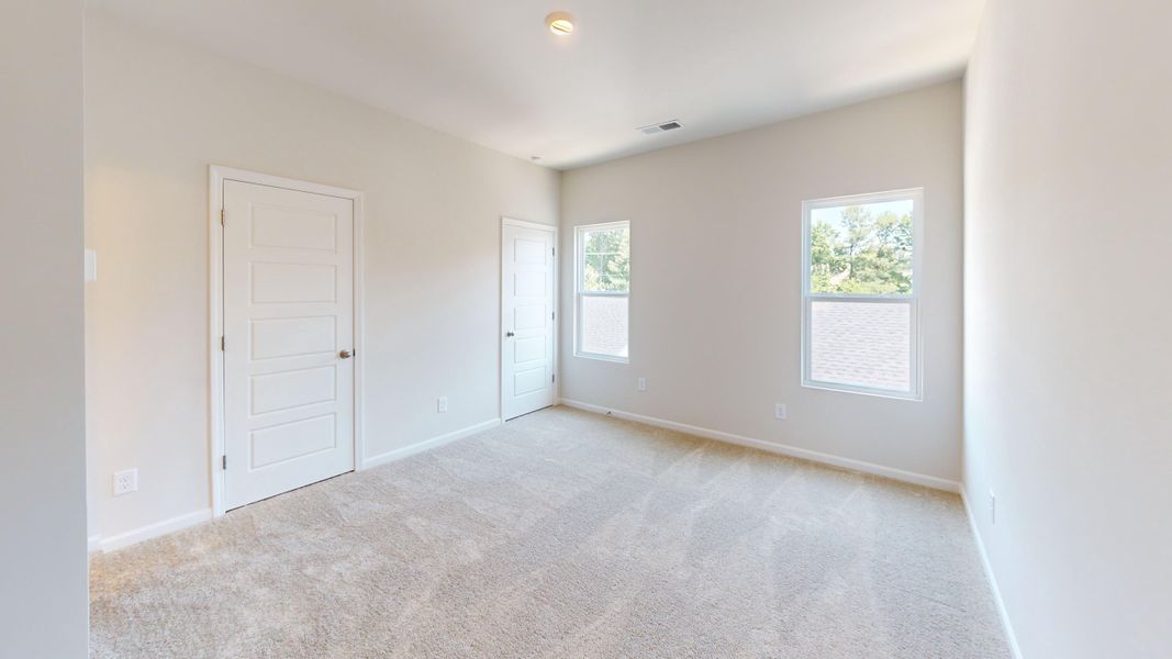 The upstairs second bedroom comes complete with walk-in closet and ensuite bathroom!