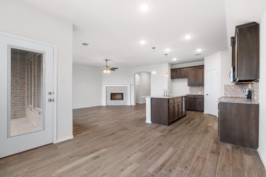 Nook & Family Room | Concept 1660 at Hunters Ridge in Crowley, TX by Landsea Homes