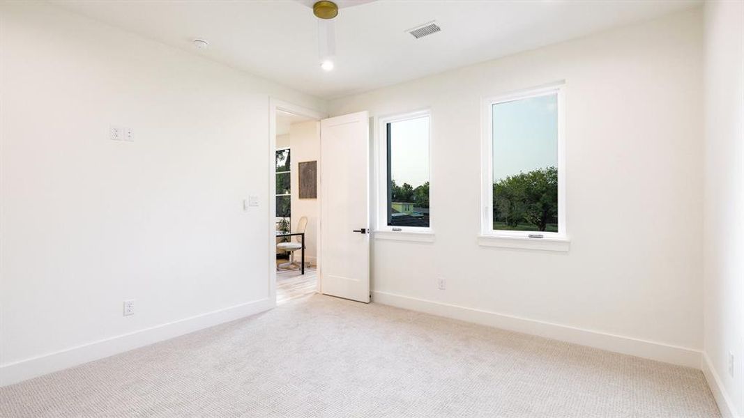 View of carpeted spare room