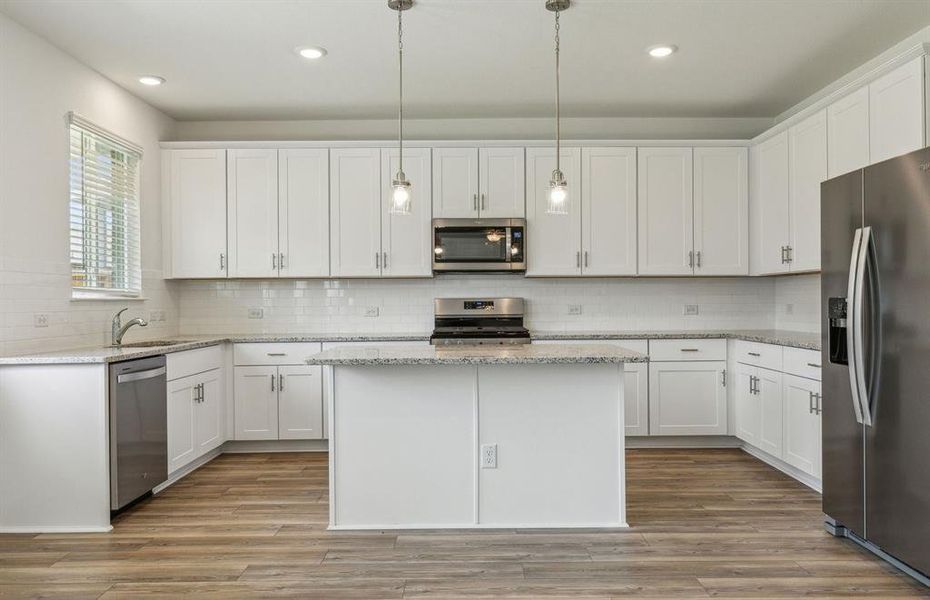 Oversized kitchen with ample cabinet space *real home pictured