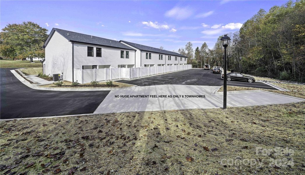 Back view-Only 8 Townhomes. No huge apartment feel here.