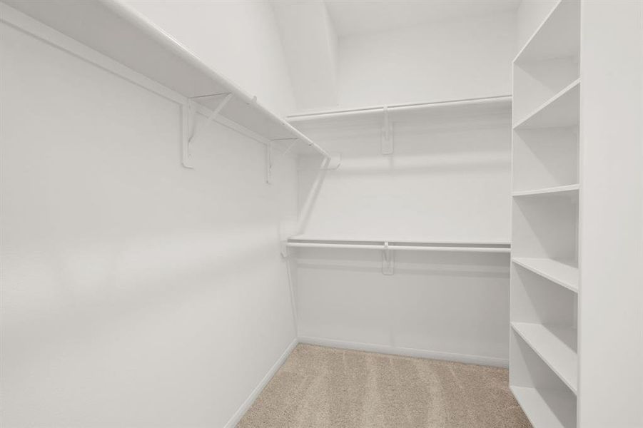 A view of your large primary walk-in Closet