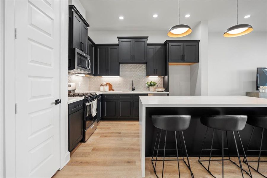 Realize your culinary aspirations in this chef's haven, where abundant cabinet space meets exquisite design elements. An ideal space for crafting gourmet meals with style and ease.