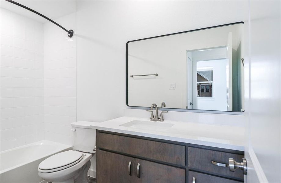 Modern guest bathroom with full bathroom with full shower/tub