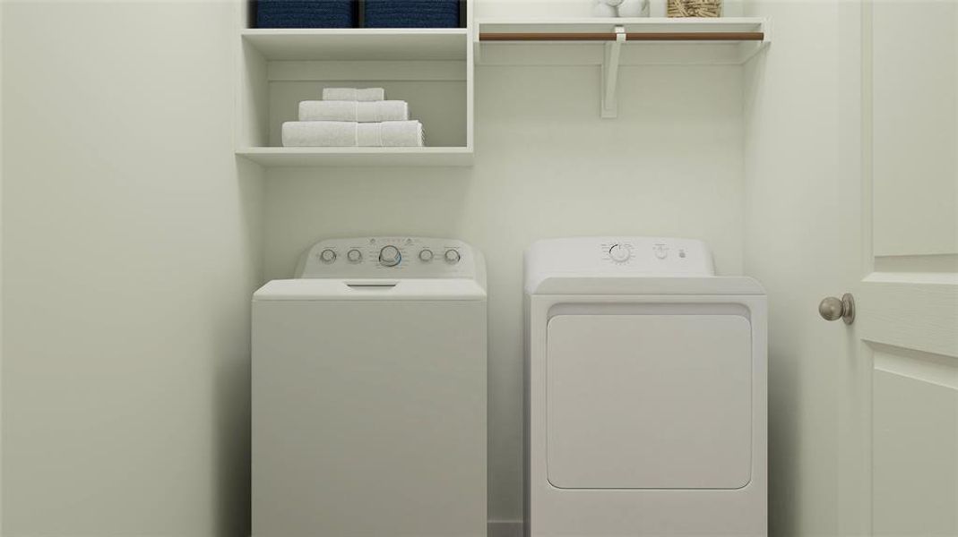 Laundry area featuring washing machine and dryer