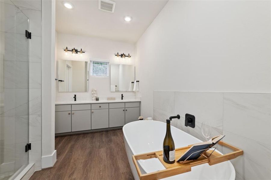 The Remarkable Owner's Bathroom Adds A Major Wow Factor With Upscale Finishes. Massive Walk In Closet Is Connected. Double Sink Vanity Gives Space And Organization. Decorative Tile And Upscale Fixtures Grace Each Of The Home's Designer Bathrooms.