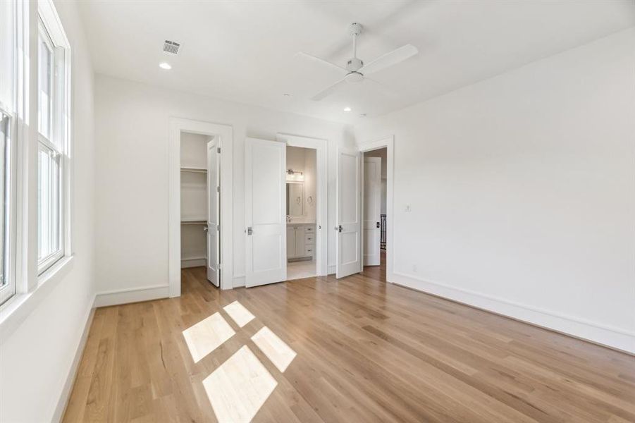 The upper laundry room is the larger of the two and features storage and a sink. Downstairs, there is a second laundry facility off of the Primary Bedroom hallway to make it convenient for people with downstairs bedrooms to do their laundry.