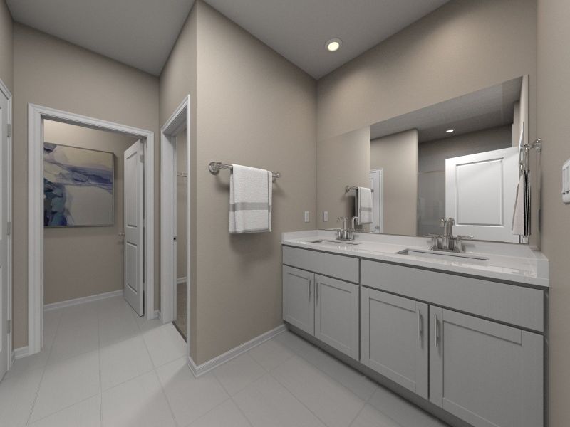 The primary bathroom features a walk-in closet and dual vanities.