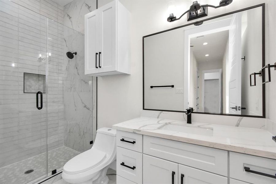 Stylish 3rd bathroom, contemporary design, perfect for guests.