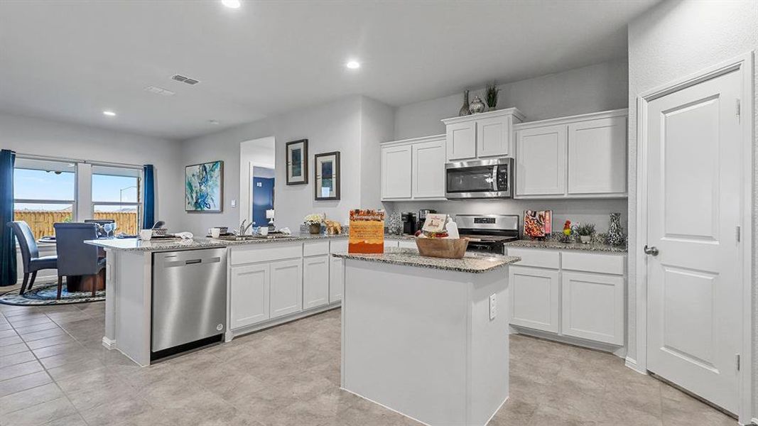 Kitchen - All Home and community information, including pricing, included features, terms, availability and amenities, are subject to change at any time without notice or obligation. All Drawings, pictures, photographs, video, square footages, floor plans, elevations, features, colors and sizes are approximate for illustration purposes only and will vary from the homes as built.