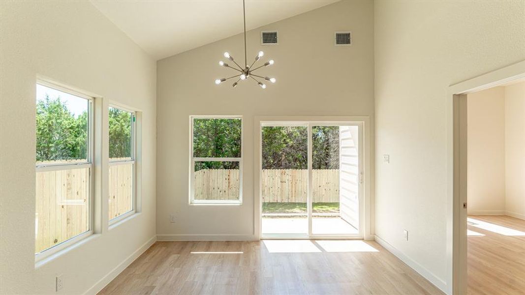 Dining area with entry to primary bedroom