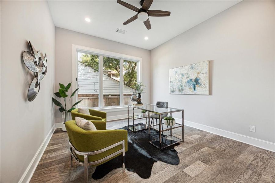 Formal Study or Sitting room with glass paneled French style enclosed doors