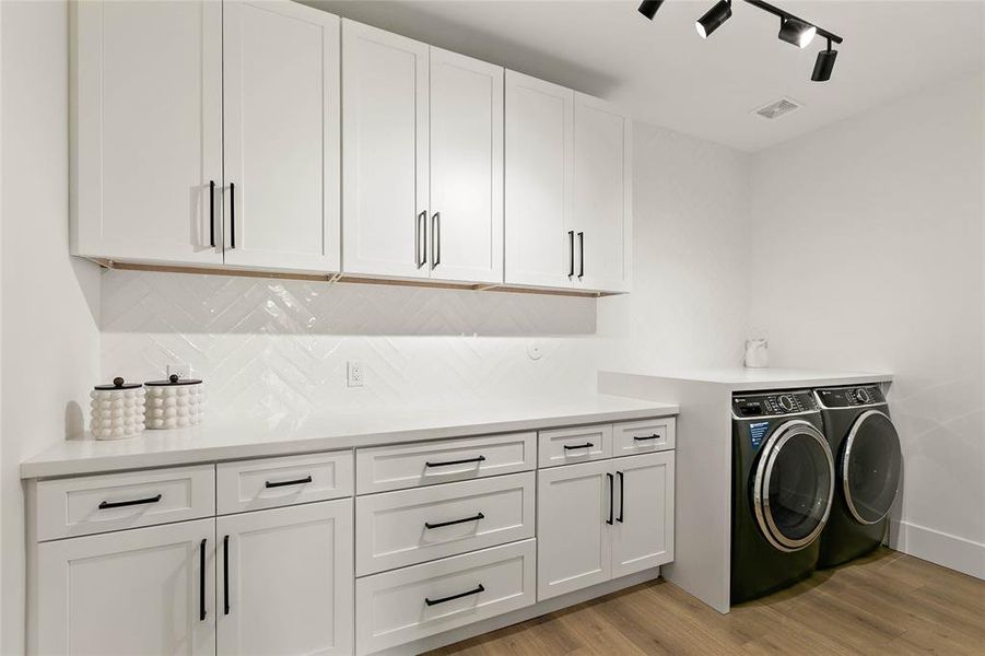 This room is almost too pretty to do your laundry in!