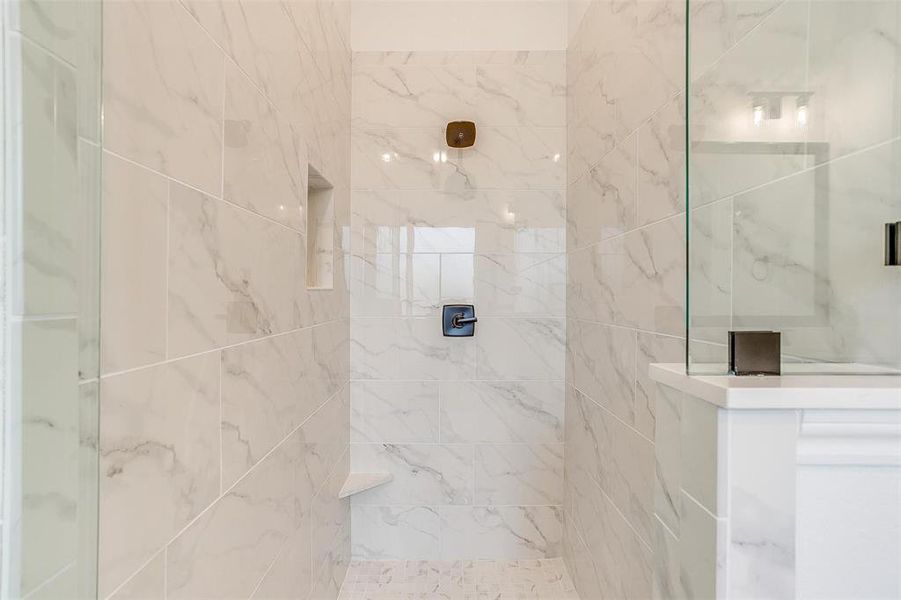 Bathroom with tiled shower