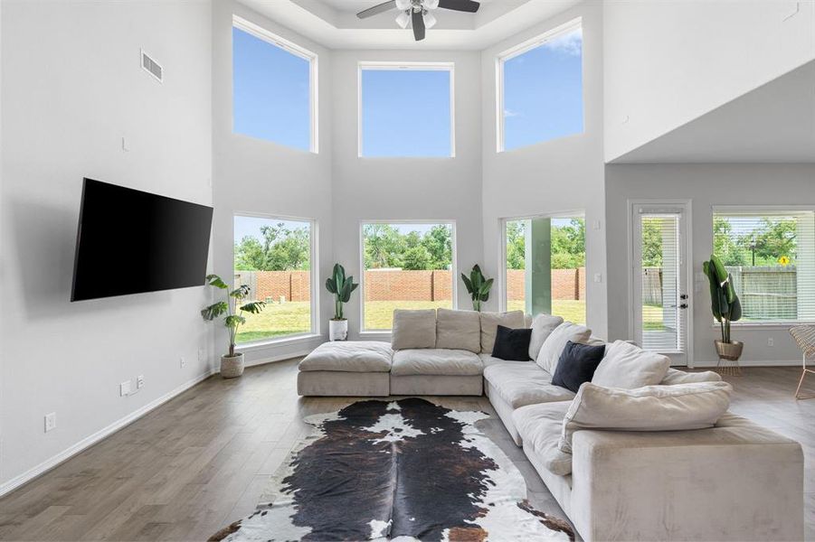 Enjoy your luxury home with soaring, tray ceilings that add a touch of depth. You'll be showered with ambient lighting from 6, stunning large windows that make a statement.