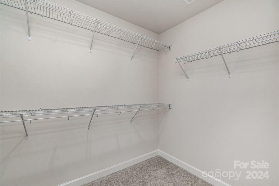 Primary walk-in closet