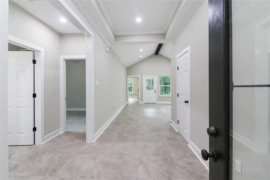 The grand entry!  Look at the fabulous wood beam as you walk into the living room