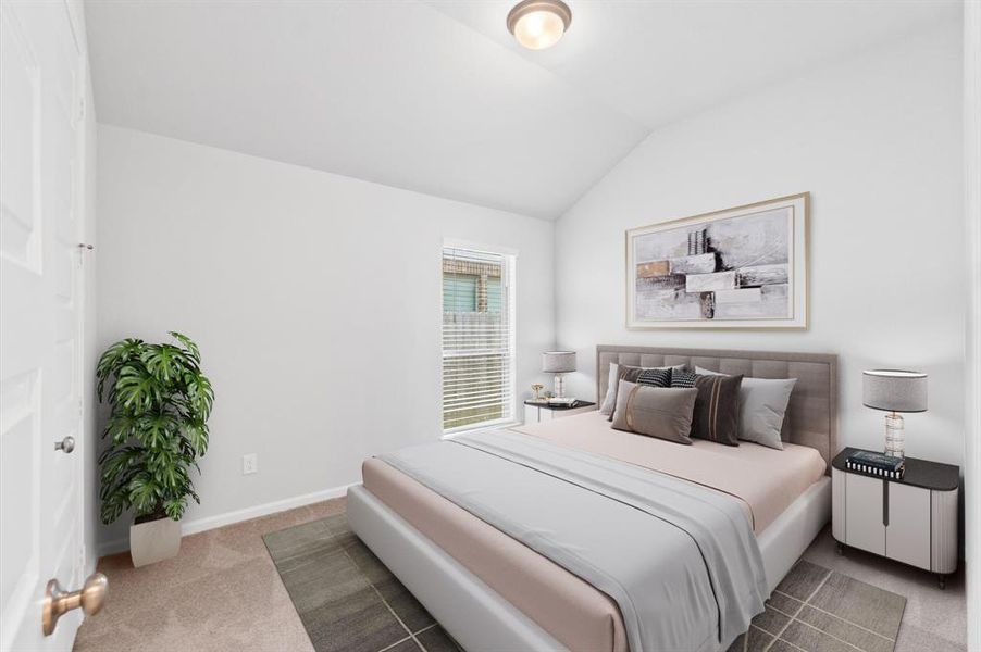 This cozy second bedroom offers a serene retreat with soft carpeting and ample natural light streaming through the wide windows.