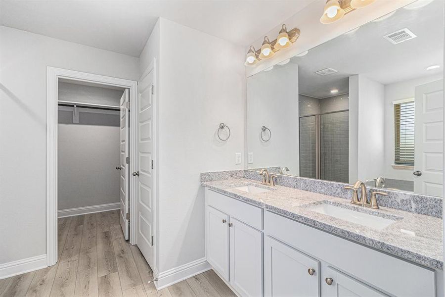 Primary Bathroom with Double Vanity Sinks