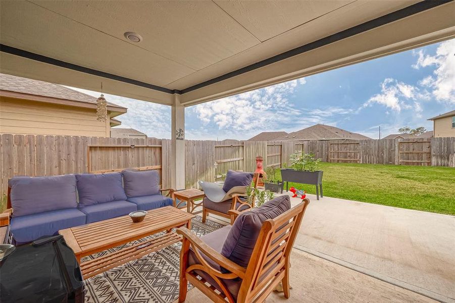 Just a partial view of the extended patio and generously sized yard