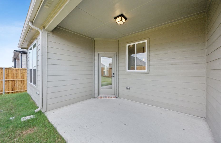 Charming covered patio *real home pictured