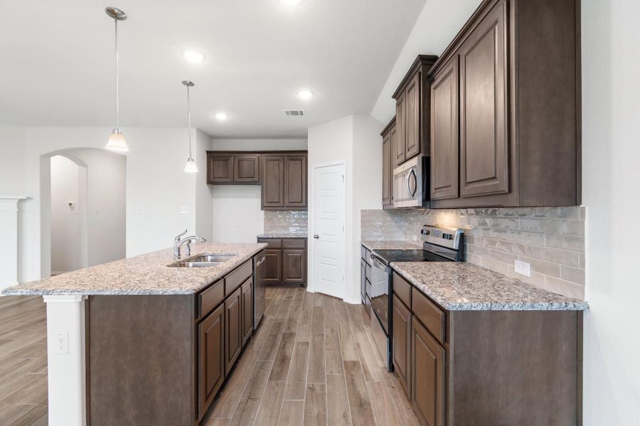 Kitchen | Concept 1660 at Hunters Ridge in Crowley, TX by Landsea Homes