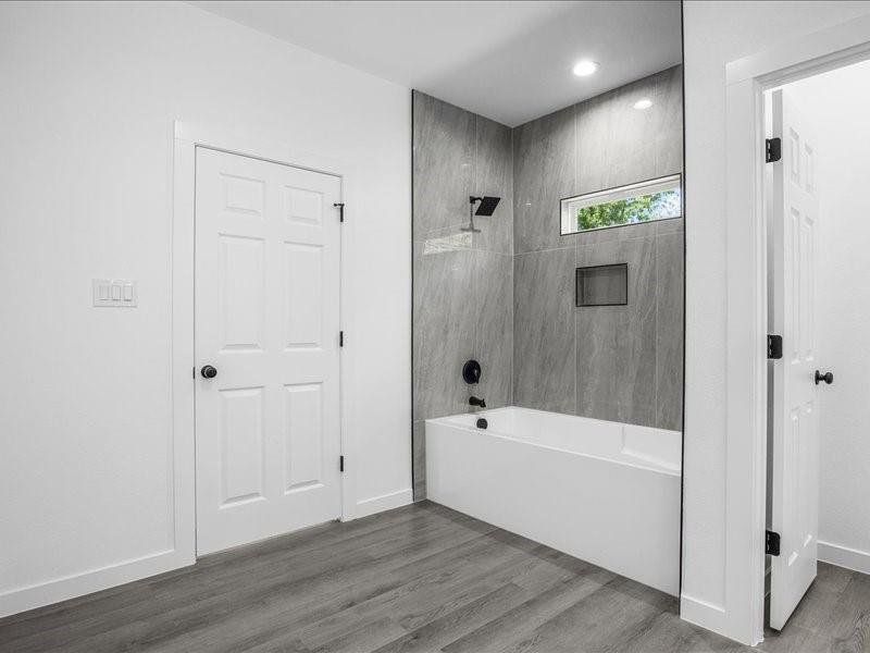 Bathroom with wood-type flooring