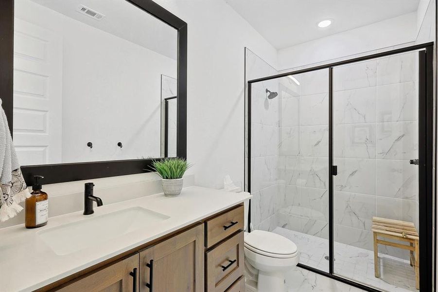 Custom vanities in secondary bathrooms.