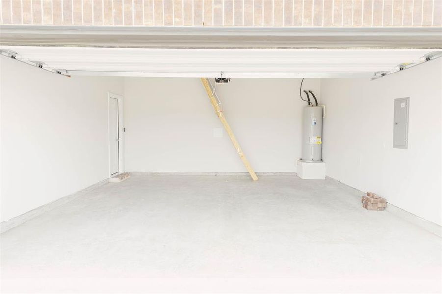 Garage with electric water heater and electric panel