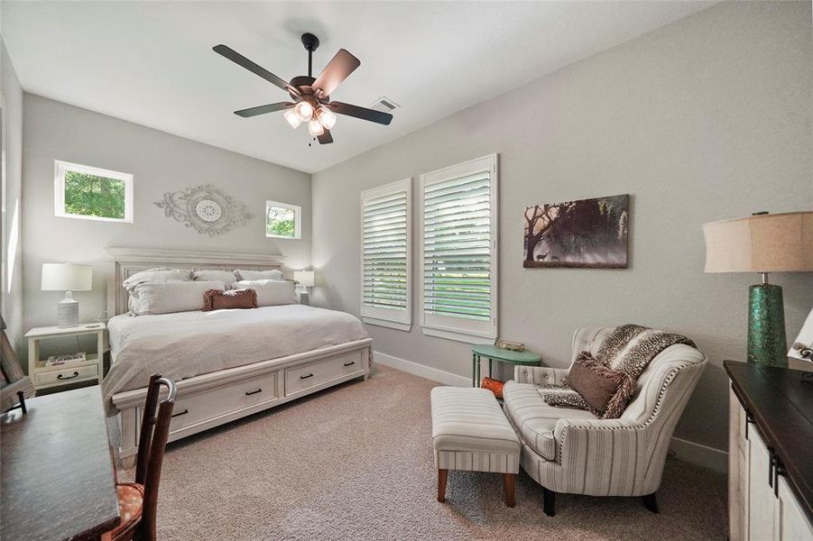 Another very spacious guest suite is ready for family and friends. This lovely suite offers neutral finishes including plush carpet, neutral paint, a lit fan, large closet and ensuite access to a Hollywood bath.