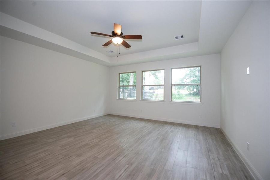 Master bedroom has large double pane windows that alow so much natural light yet privacy since there are no neighbors on the other side.